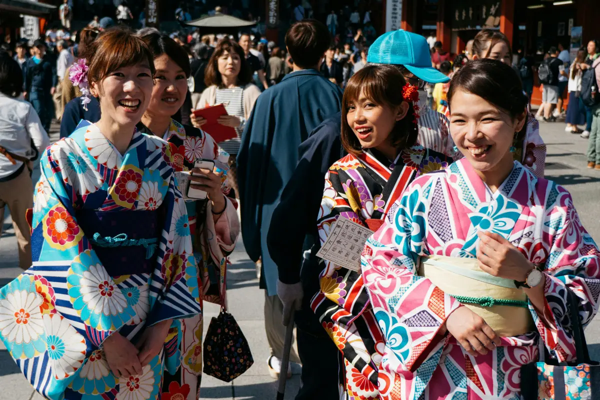 Travelers using Japanese phrases at a Tokyo station